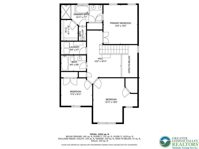 a picture of a bench in front of a wall