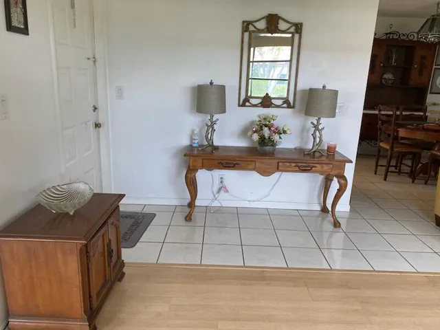 a living room with furniture and window