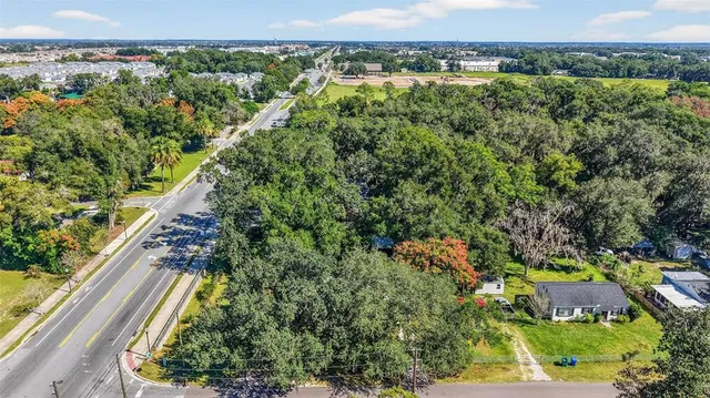 a view of a chairs with a small yard