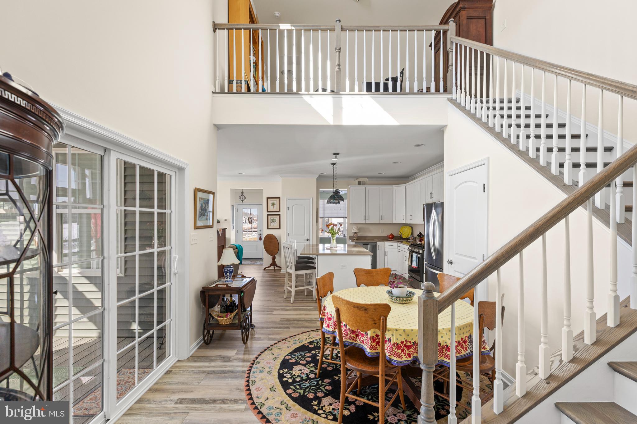 200 Fox Street Milton, DE 19968 - Photo 4 of 57 Central staircase to upstairs or outside