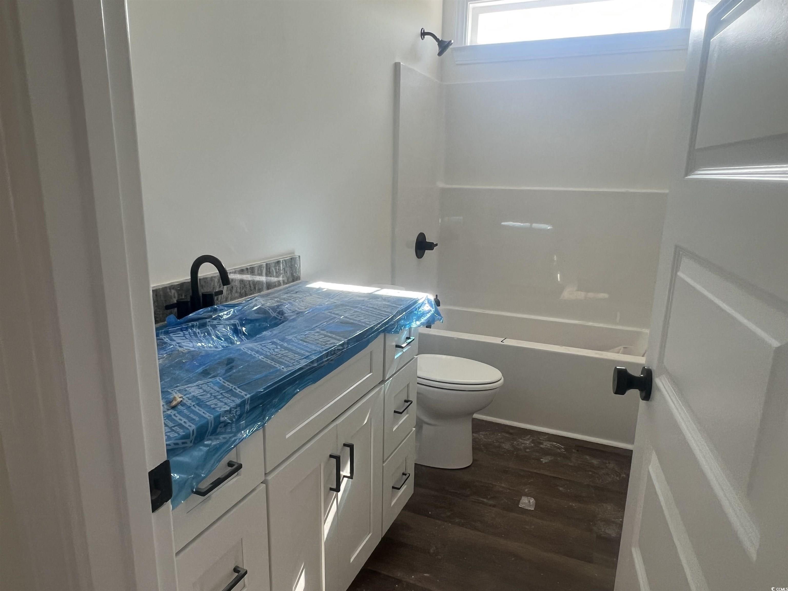 3597 Valley Forge Road Aynor, SC 29511 - Photo 24 of 31 Full bath with vanity, shower / tub combination, and dark wood finished floors