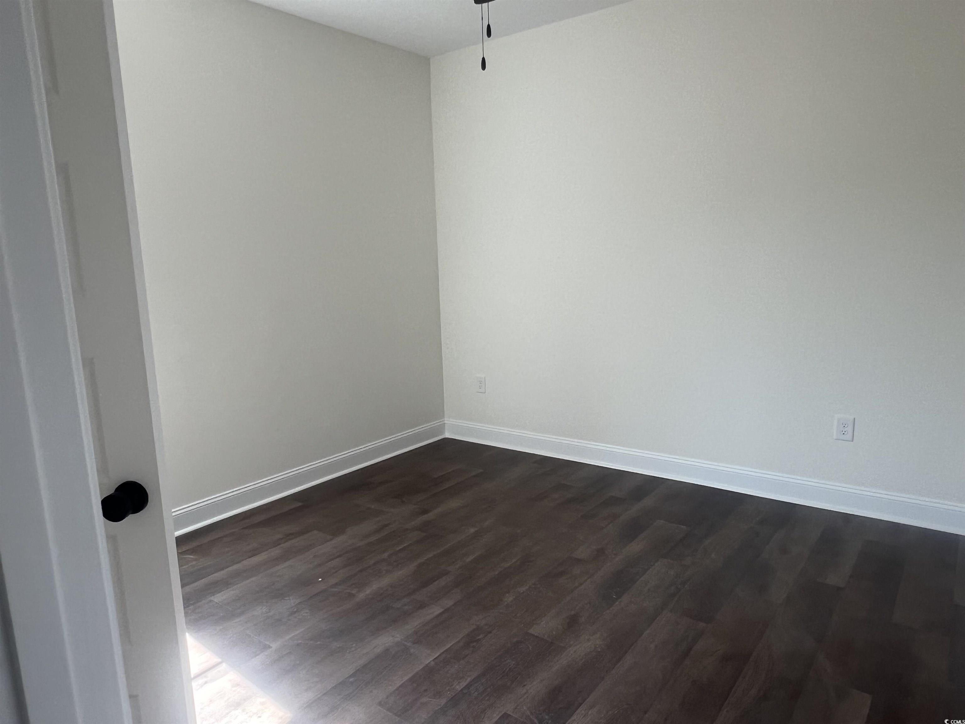 3597 Valley Forge Road Aynor, SC 29511 - Photo 27 of 31 Unfurnished room with dark wood-style flooring and ceiling fan