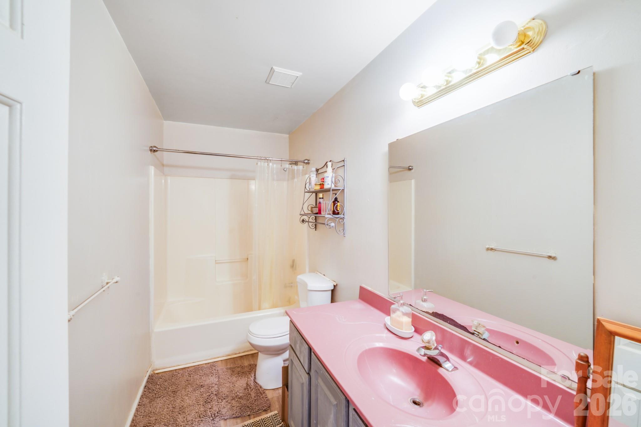 2116 Bon Villa Way Fort Mill, SC 29708 - Photo 12 of 28 a bathroom with a sink toilet and shower