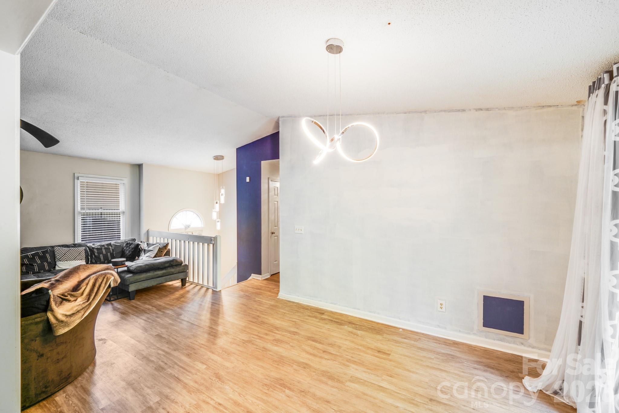 2116 Bon Villa Way Fort Mill, SC 29708 - Photo 18 of 28 a view of a livingroom with furniture and a window