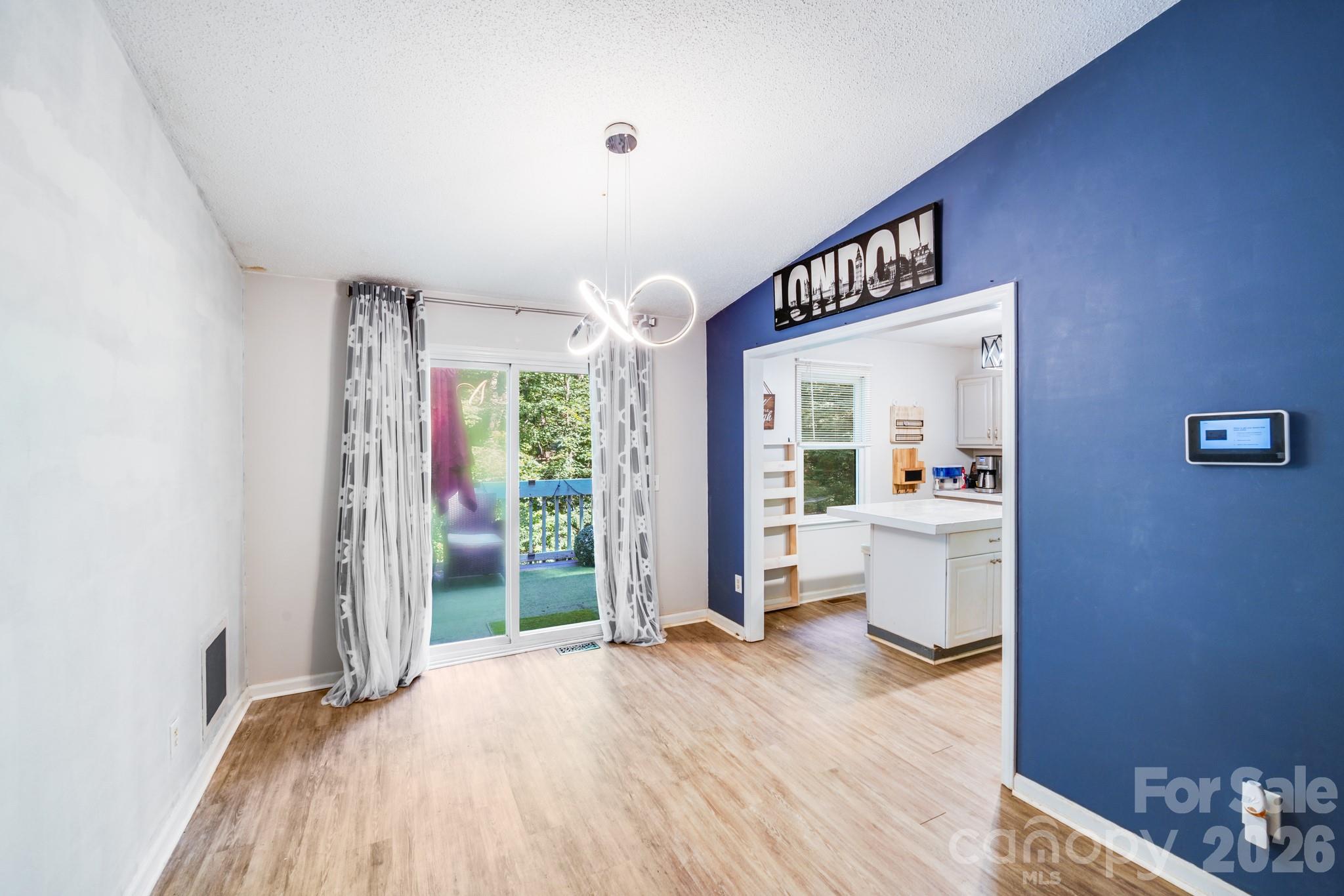 2116 Bon Villa Way Fort Mill, SC 29708 - Photo 5 of 28 a view of livingroom with furniture and staircase