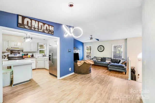 a bed room with a bed and a television