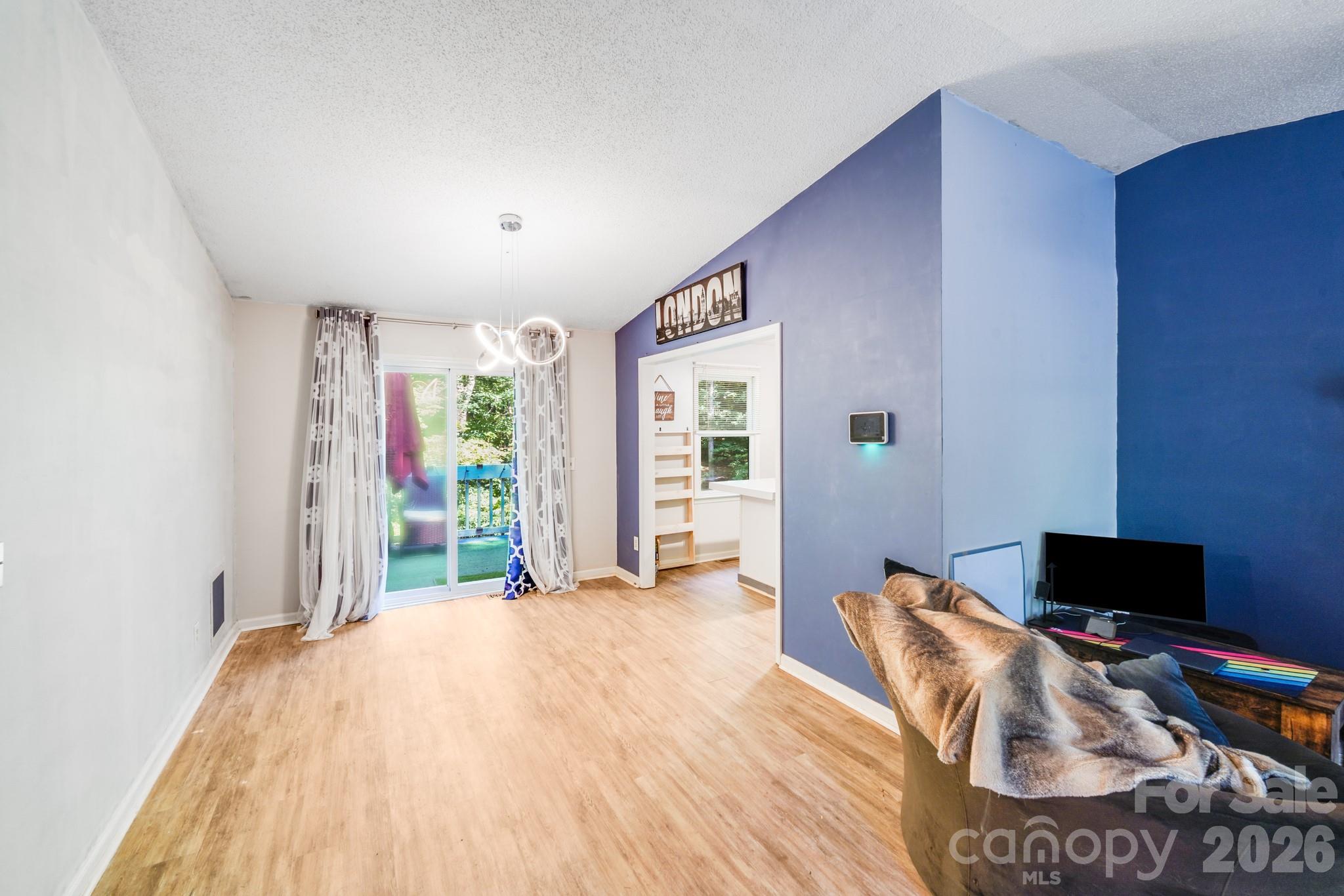 2116 Bon Villa Way Fort Mill, SC 29708 - Photo 9 of 28 a bed room with a bed and a television