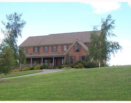 333 Whitestown Road Harmony, PA 16037 - Photo 1 of 16 Exterior Front. A paved Governor s drive leads up to the front door, and connects to paved drvie that leads to the four car integral and 2 car detached garages. Lush landscaping surrounds the home.