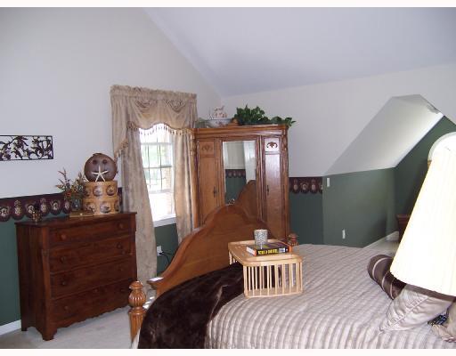 333 Whitestown Road Harmony, PA 16037 - Photo 7 of 16 Master Bedroom. The master suite has a sitting area, as well as a full bath and large, walk-in closet.