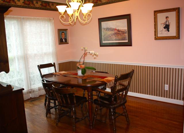 7282 Old Franklin Road Fairview, TN 37062 - Photo 9 of 20 Dining room off foyer with hardwoods in excellent condition. Wall paper, but at this price, you can make it your own!