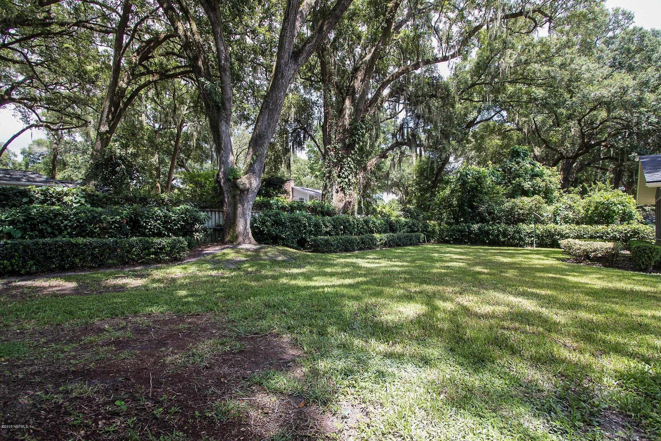 9435 Ponder Road Jacksonville, FL 32257 - Photo 29 of 33 a view of a field with trees