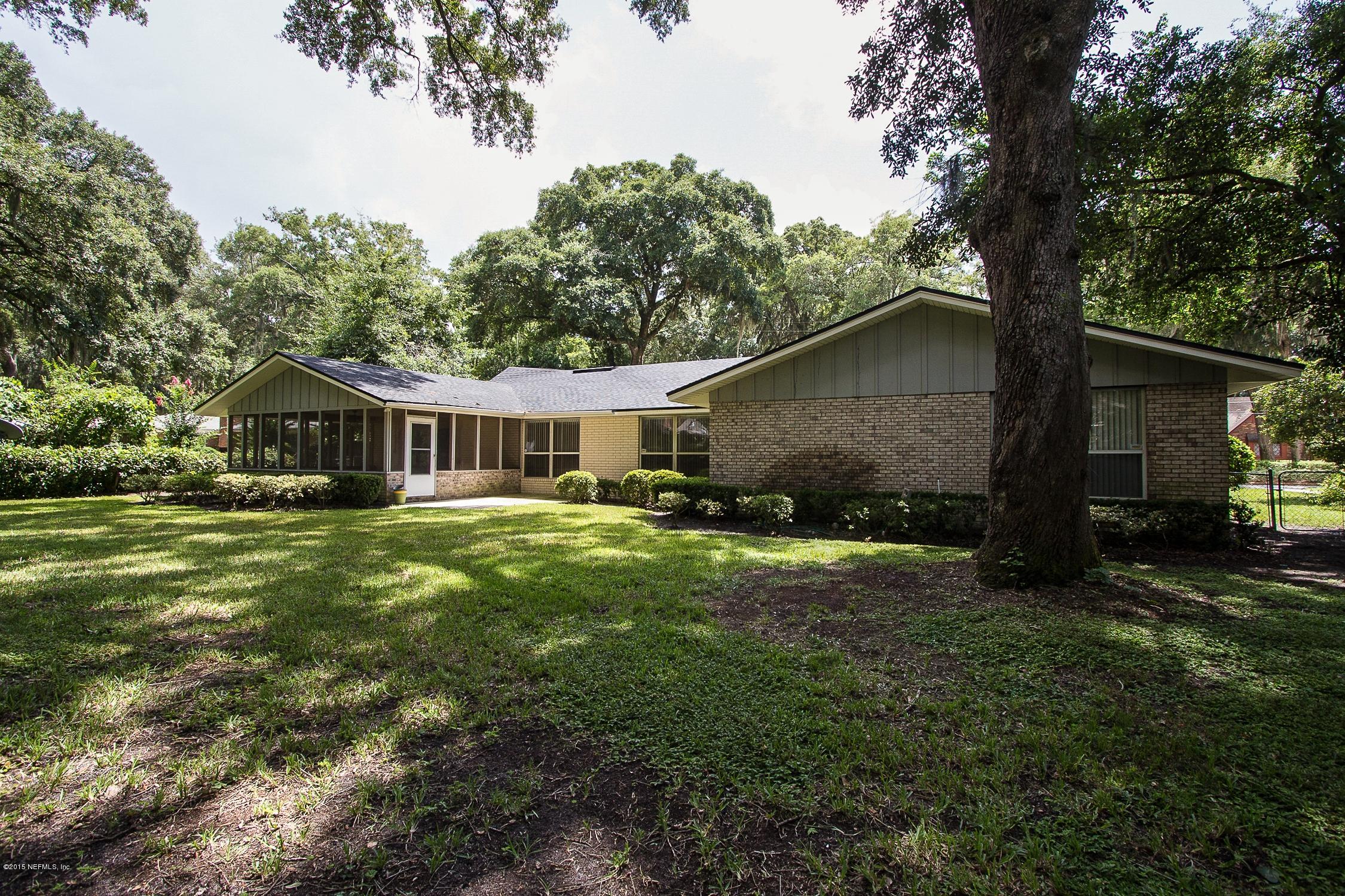 9435 Ponder Road Jacksonville, FL 32257 - Photo 32 of 33 a front view of house with yard and green space