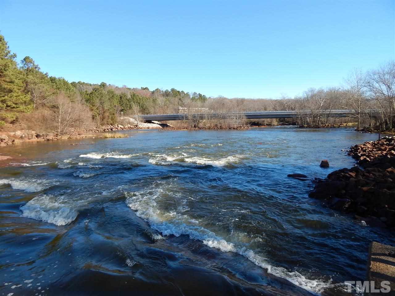 5051 Neuse Commons Lane Raleigh, NC 27616 - Photo 21 of 23 a view of lake with mountain