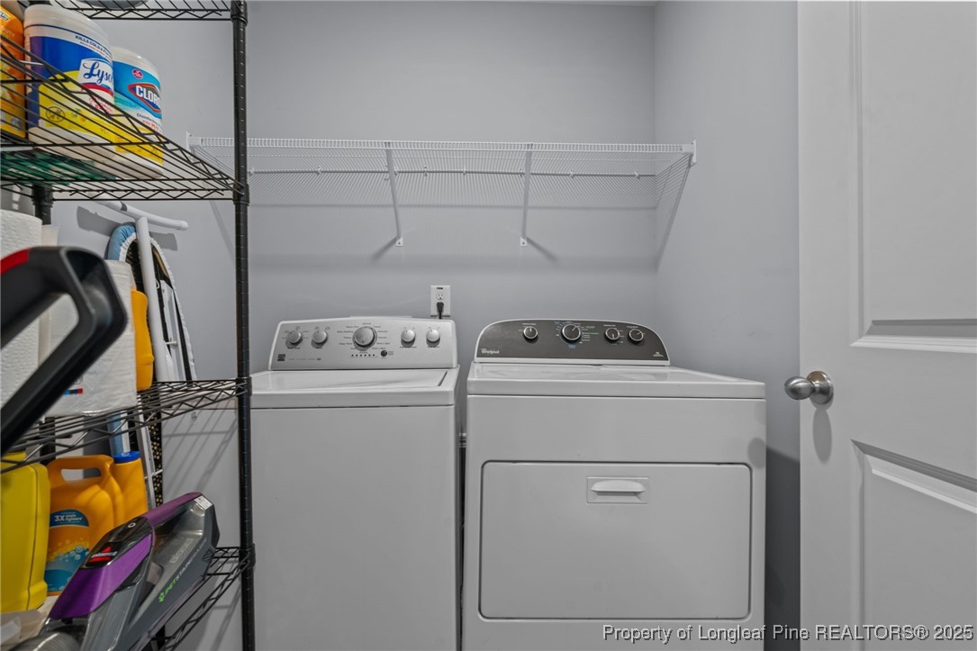 125 Solomon Drive Cameron, NC 28326 - Photo 23 of 49 a utility room with dryer and washer