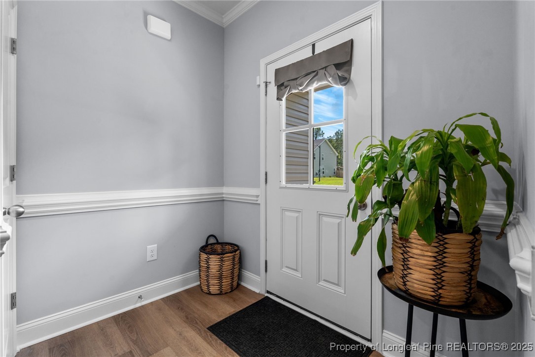 125 Solomon Drive Cameron, NC 28326 - Photo 3 of 49 a window with a potted plant on a table