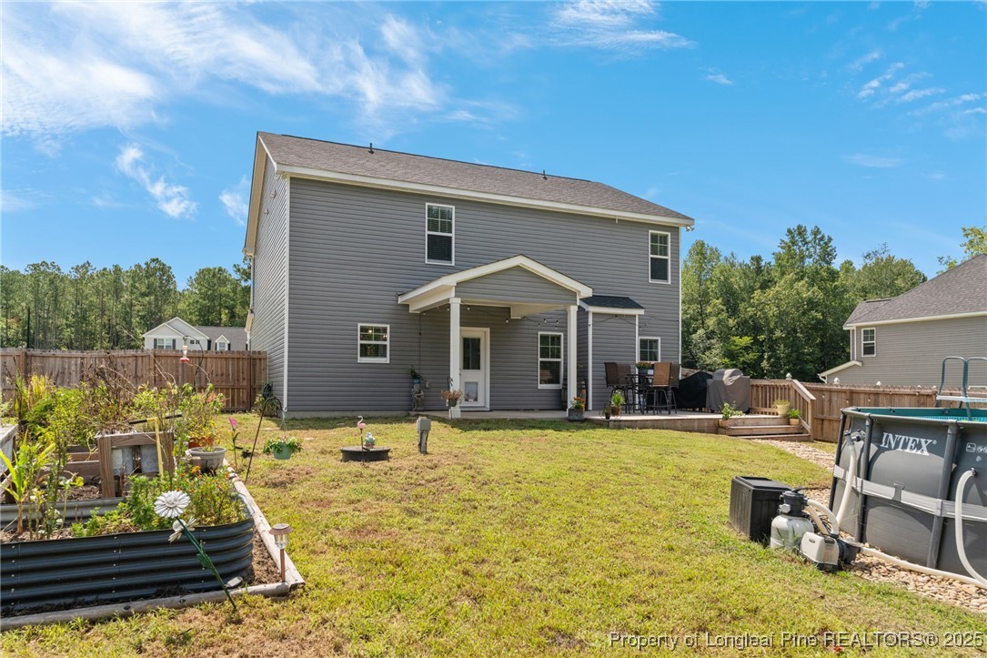 125 Solomon Drive Cameron, NC 28326 - Photo 37 of 49 a front view of a house with swimming pool