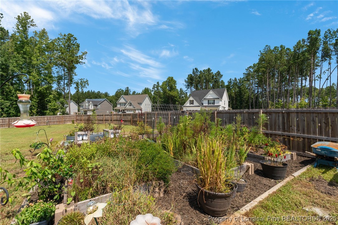 125 Solomon Drive Cameron, NC 28326 - Photo 39 of 49 a view of a garden with plants