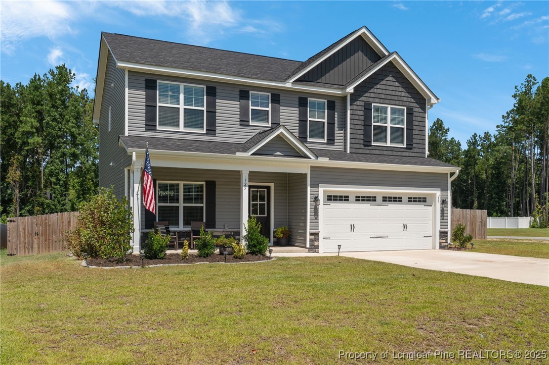 125 Solomon Drive Cameron, NC 28326 - Photo 42 of 49 a front view of a house with a yard