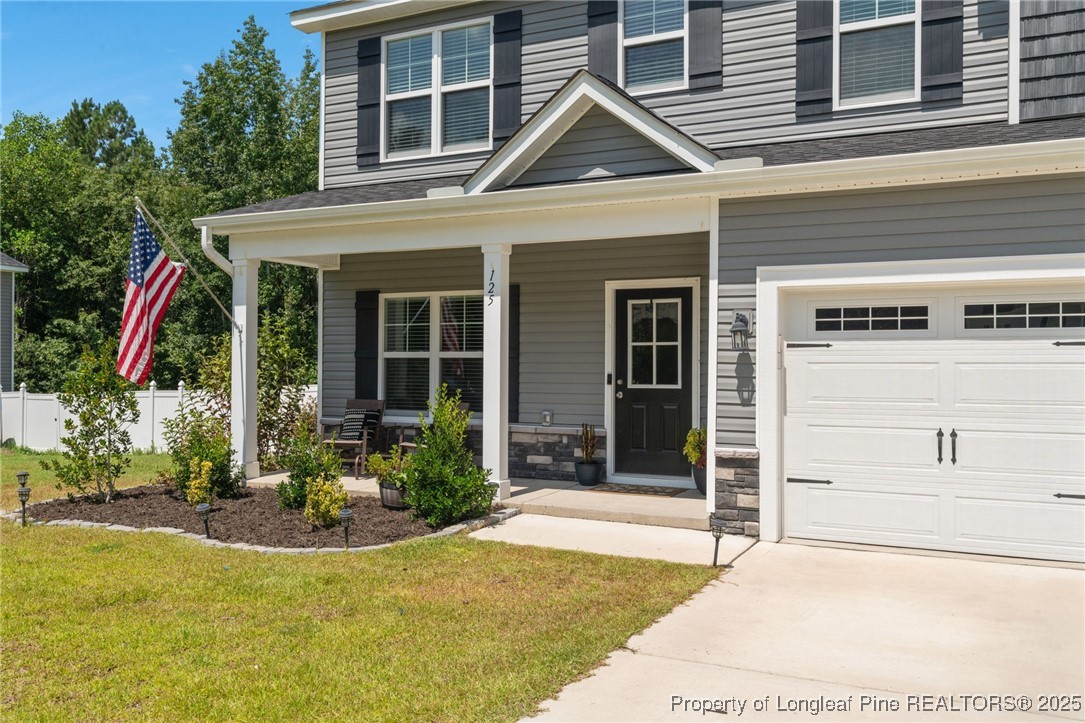 125 Solomon Drive Cameron, NC 28326 - Photo 43 of 49 a view of house and front door