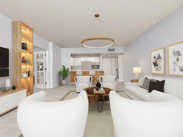 a spacious bedroom with a large bed and a flat screen television