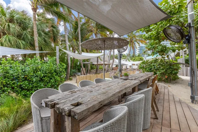 a outdoor space with lots of white furniture