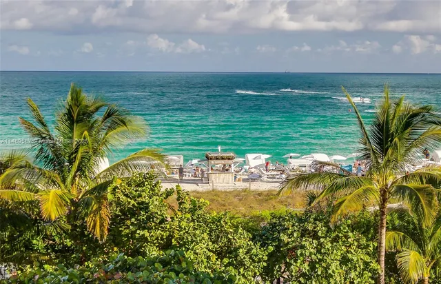 a view of a lake with a big yard