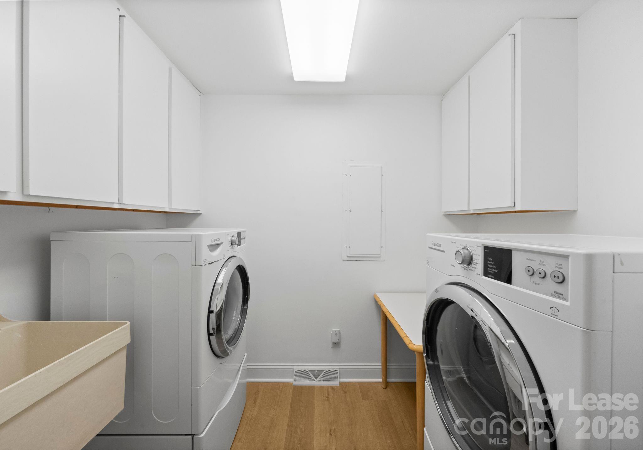 19709 Stough Farm Road Cornelius, NC 28031 - Photo 17 of 48 a utility room with dryer and washer