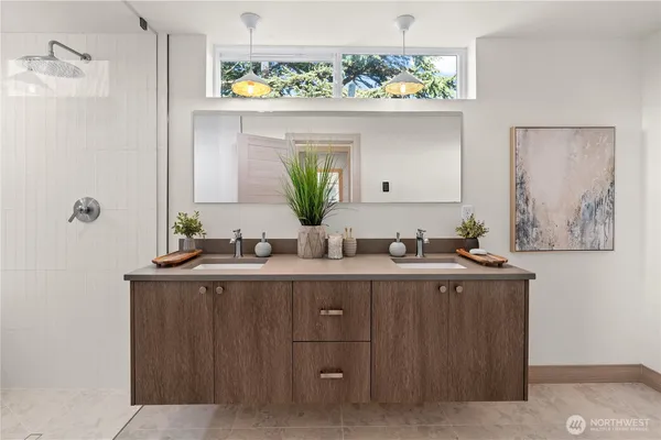 a bathroom with a sink and a mirror