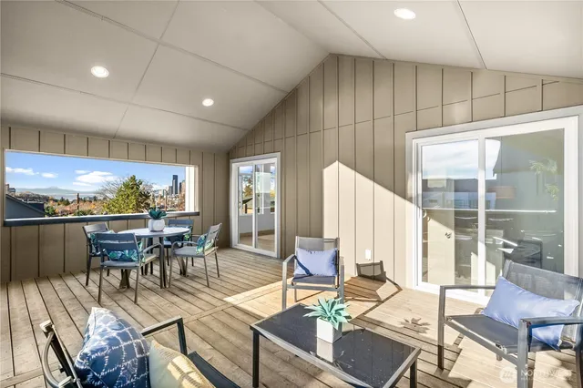 a view of a dining room with furniture window and outside view