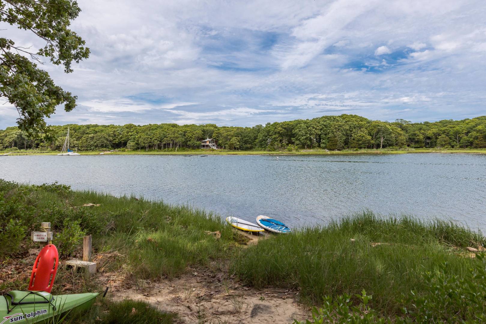 99 Isle Of Wight Road East Hampton, NY 11937 - Photo 2 of 24 a view of lake with mountain