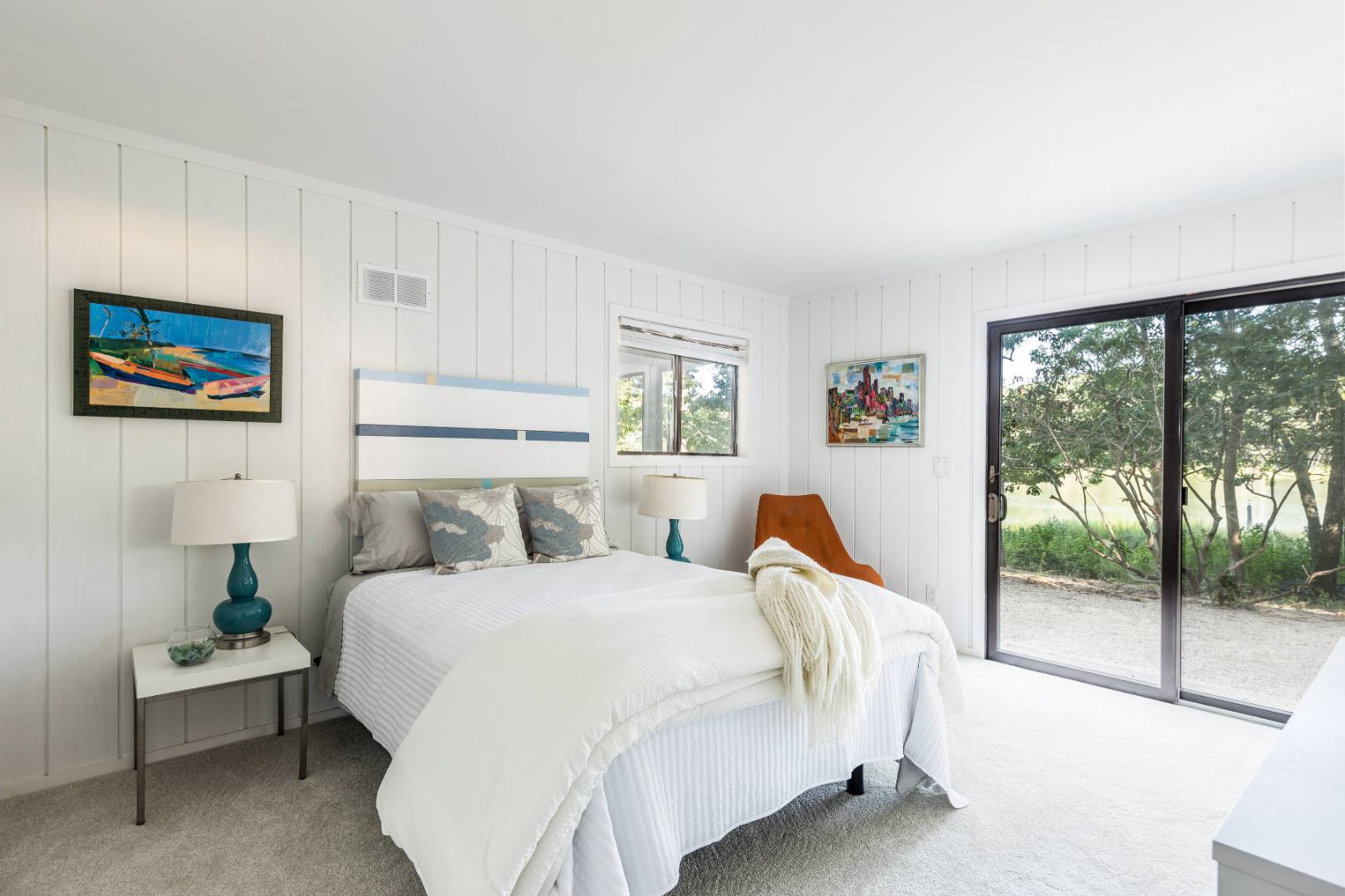 99 Isle Of Wight Road East Hampton, NY 11937 - Photo 16 of 24 a bedroom with a bed and a large window