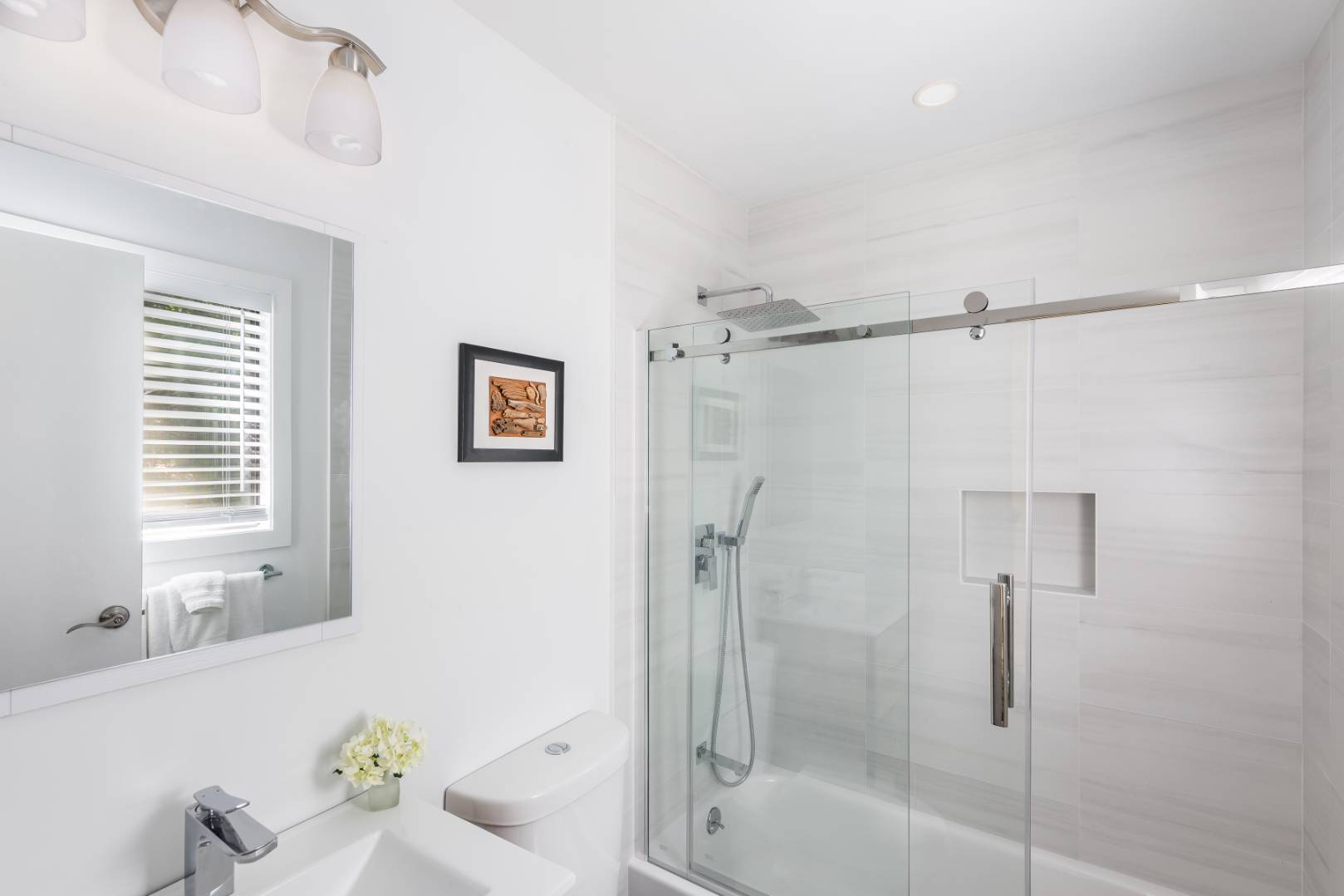 99 Isle Of Wight Road East Hampton, NY 11937 - Photo 17 of 24 a bathroom with a shower and a bathtub