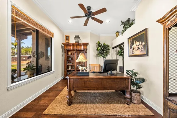 a spacious bathroom with double vanity and a bathtub