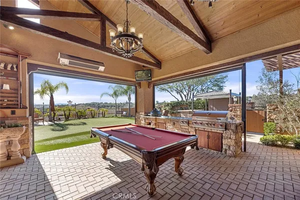 a view of a house with sitting space and garden