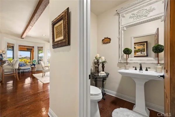 a view of a backyard with sitting area