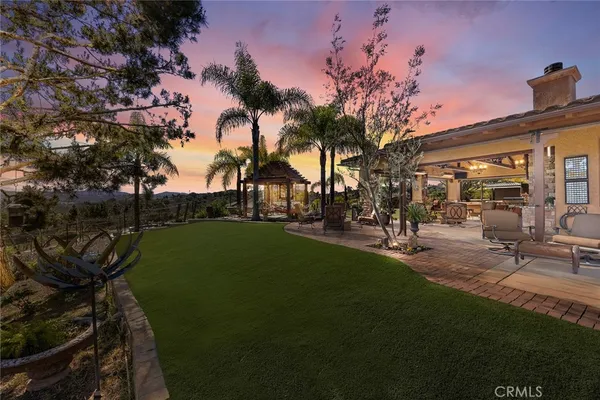 a backyard of a house with lots of green space