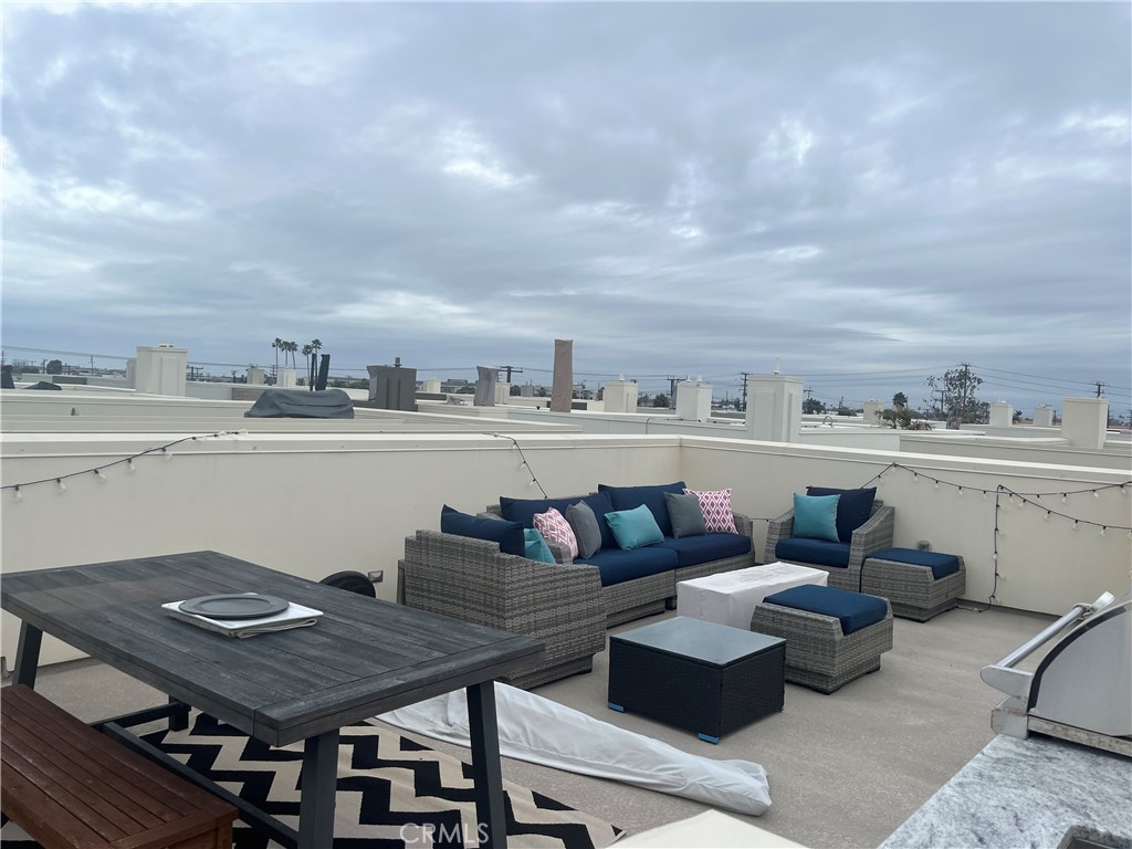 21 Ebb Tide Circle Newport Beach, CA 92663 - Photo 20 of 24 a view of a terrace with furniture