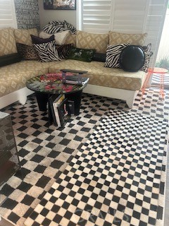 21 Ebb Tide Circle Newport Beach, CA 92663 - Photo 7 of 24 a living room with a couch and a rug