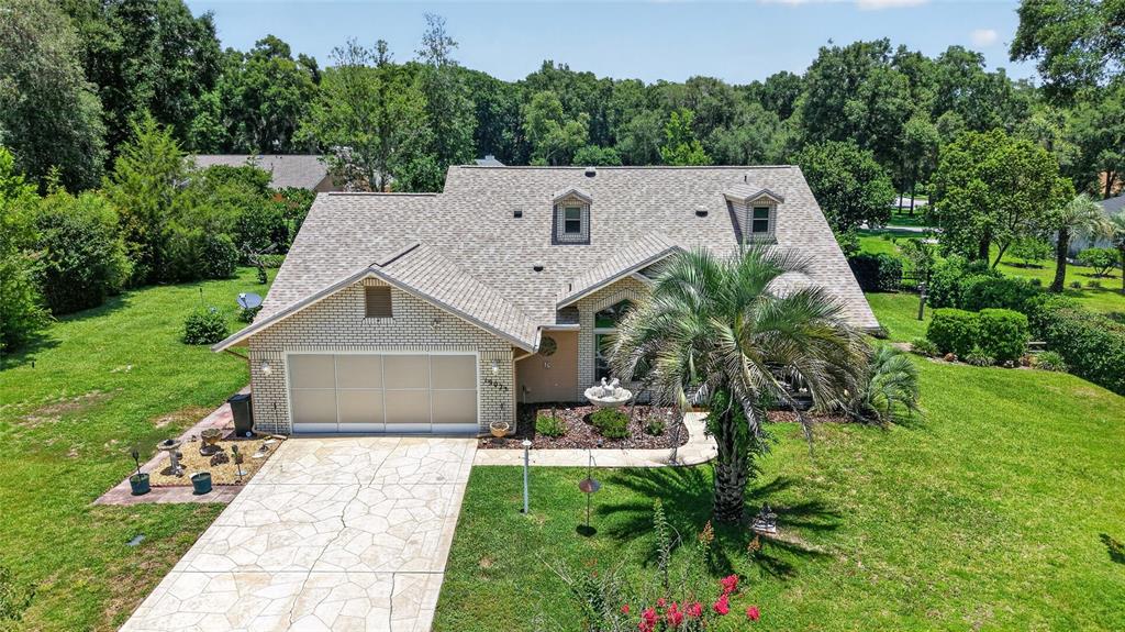 19025 Southwest 98th Loop Dunnellon, FL 34432 - Photo 58 of 80 a aerial view of a house with a yard