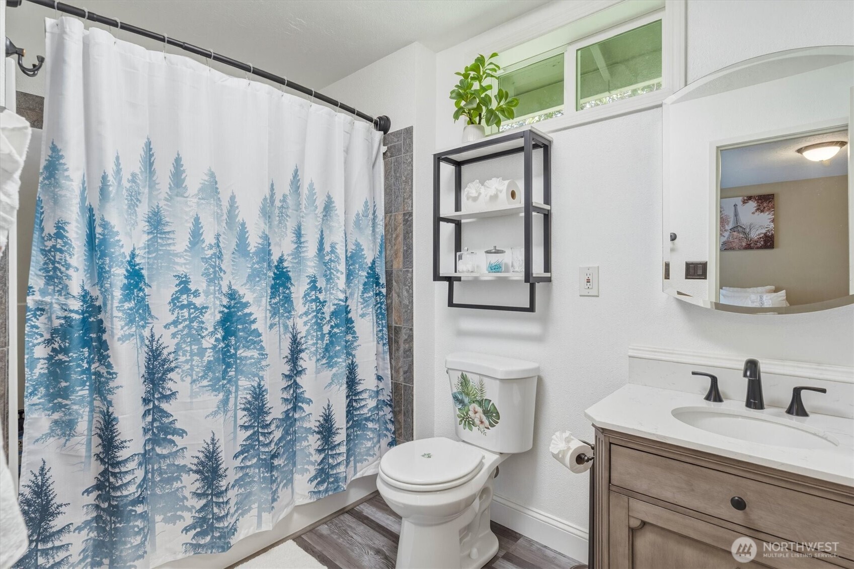 3805 Pacific Way Longview, WA 98632 - Photo 21 of 37 a bathroom with a granite countertop sink a toilet and a mirror