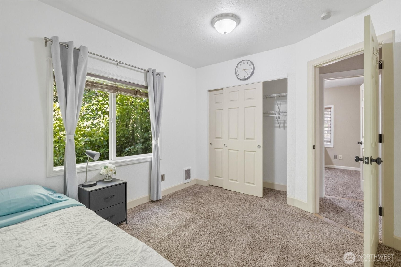 3805 Pacific Way Longview, WA 98632 - Photo 24 of 37 a bedroom with a bed and a large window
