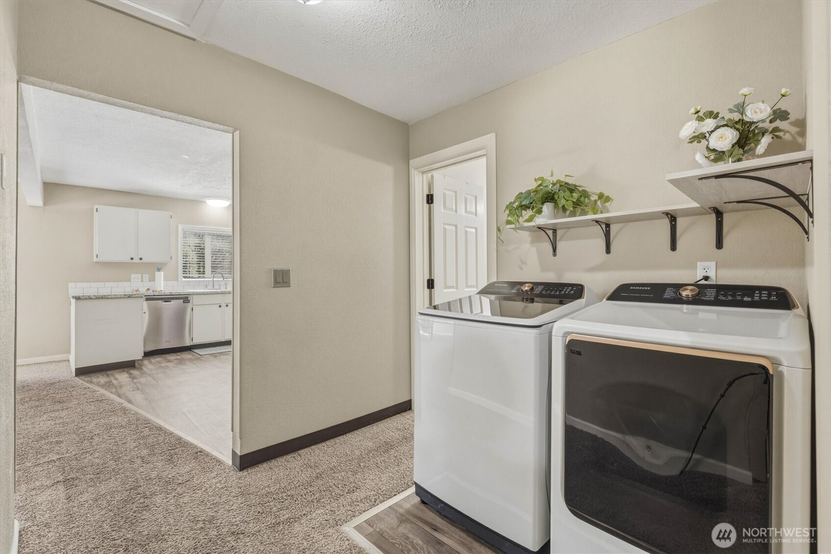 3805 Pacific Way Longview, WA 98632 - Photo 28 of 37 a kitchen with stainless steel appliances granite countertop a stove a sink and a refrigerator