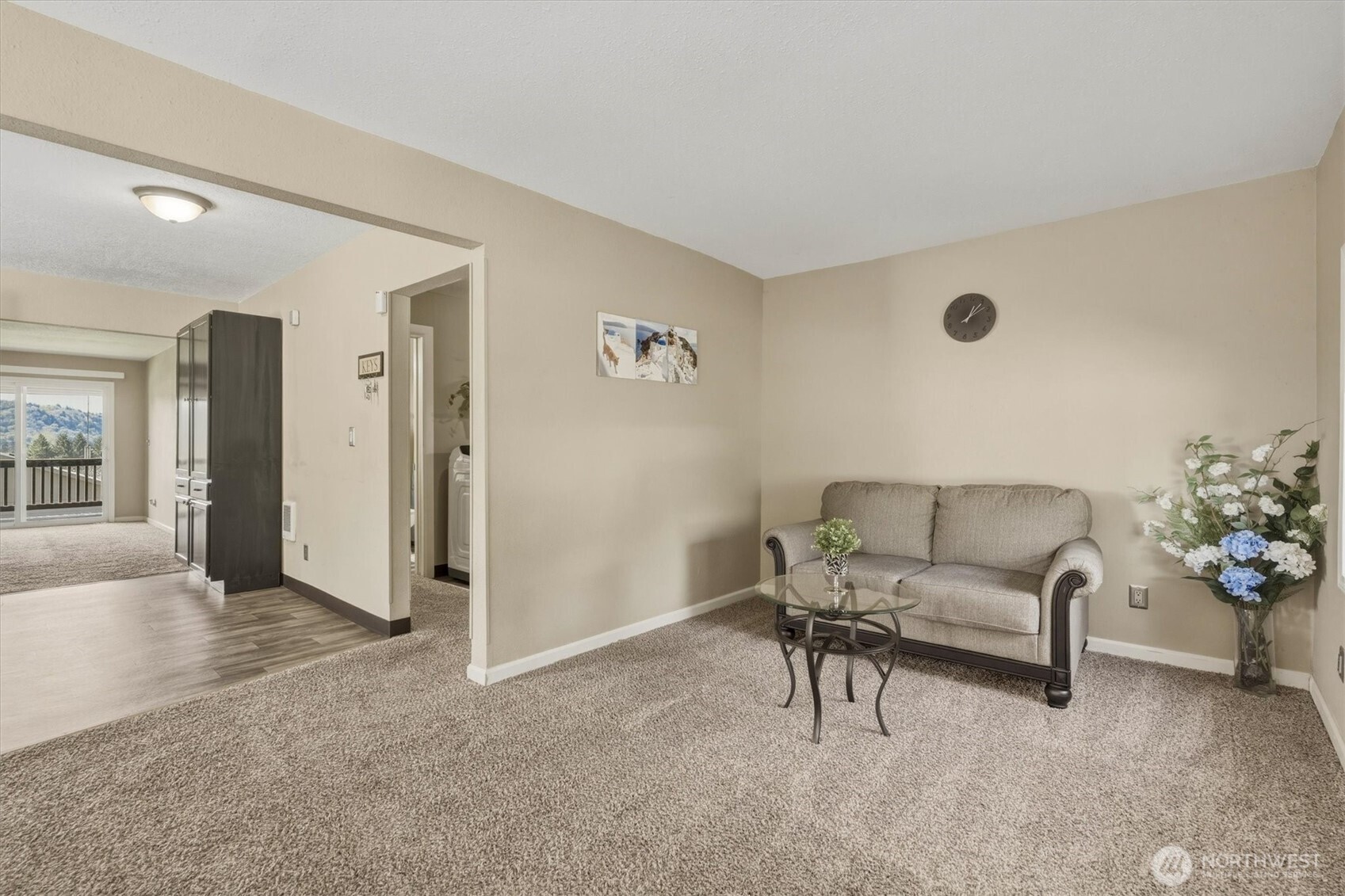 3805 Pacific Way Longview, WA 98632 - Photo 7 of 37 a living room with furniture and flowers