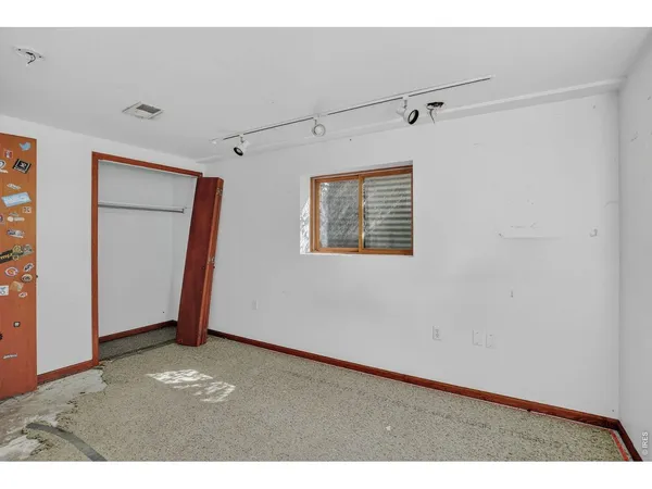 a view of a big room with closet area