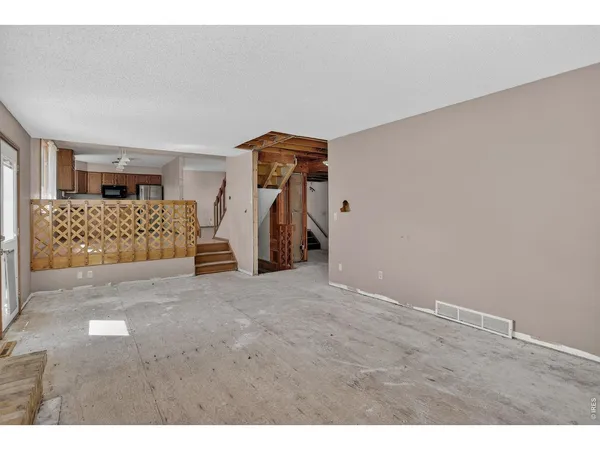 a view of a livingroom with entryway