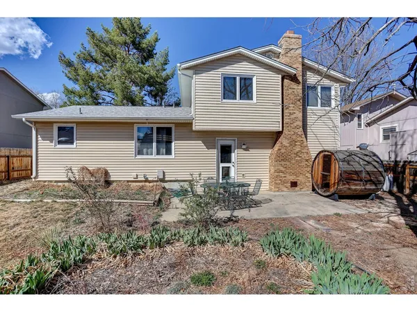 a house view with a backyard space