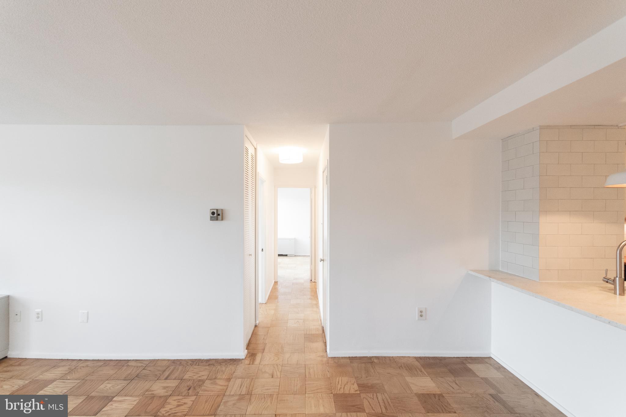 1301 Delaware Avenue Southwest, Unit N512 Washington, DC 20024 - Photo 14 of 28 Hallway to bedrooms