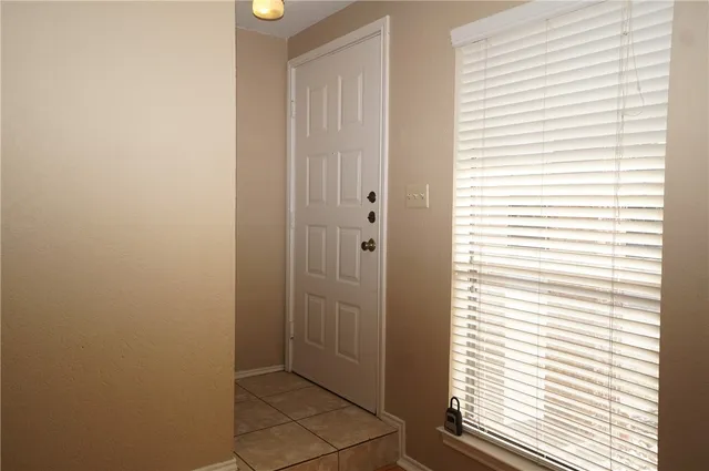 a view of a bathroom with a window
