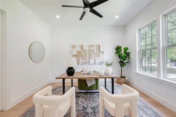 a bathroom with a sink a shower and a mirror