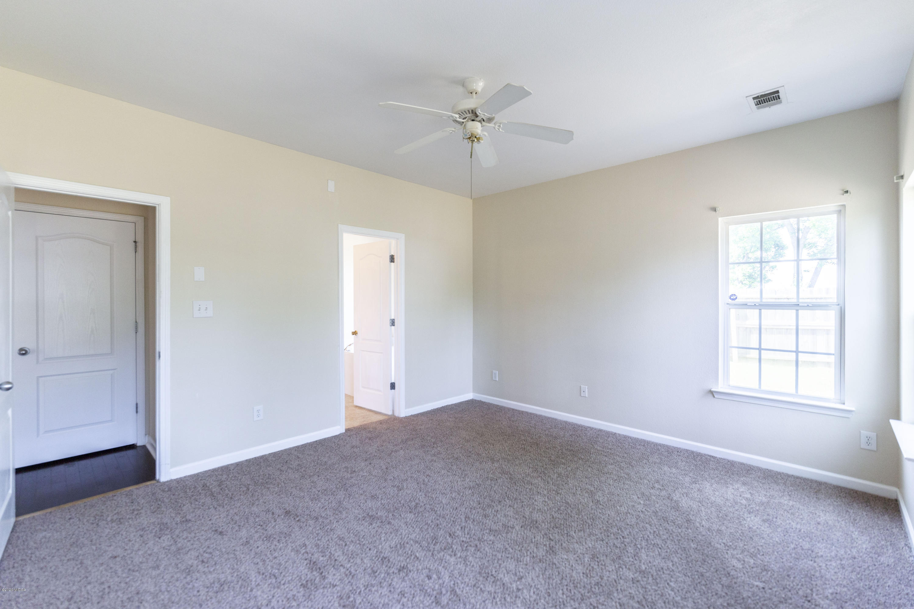 415 Bob White Road Macon, GA 31216 - Photo 22 of 43 a view of an empty room with a window